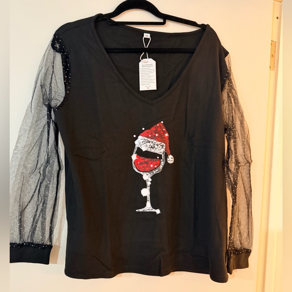 Black Top with Sheer Sleeves and Festive Graphic